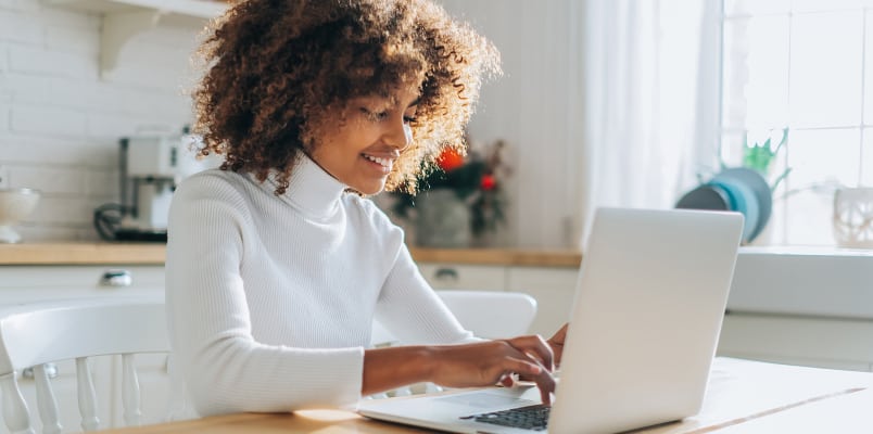 Man wearing boots on top of mountain