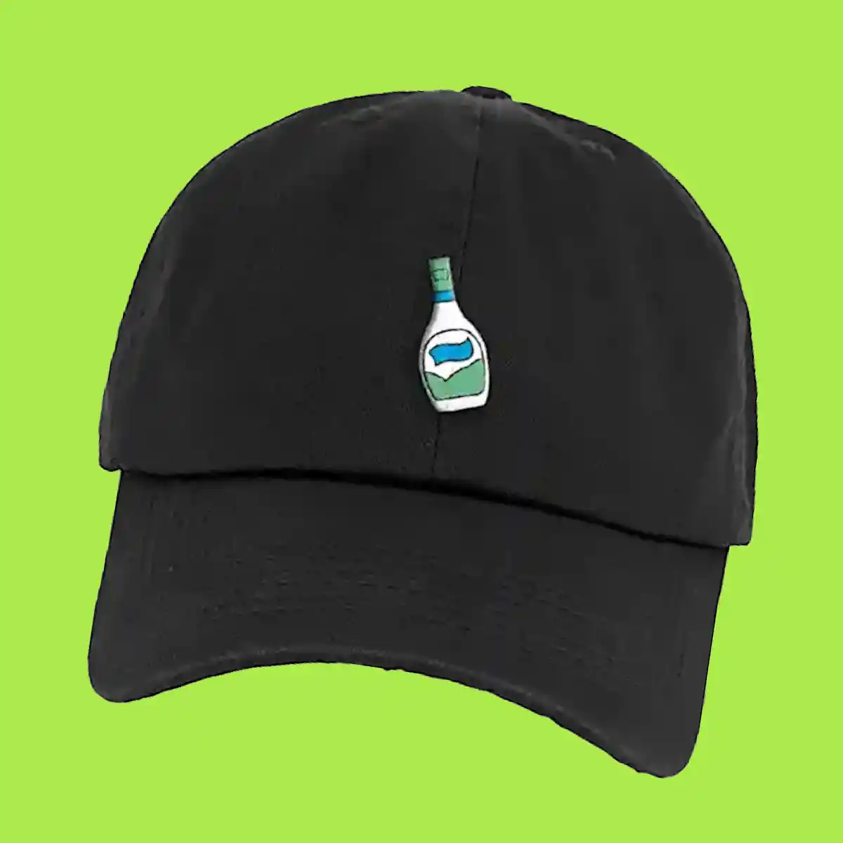 Black cap with embroidered ranch dressing bottle on a green background