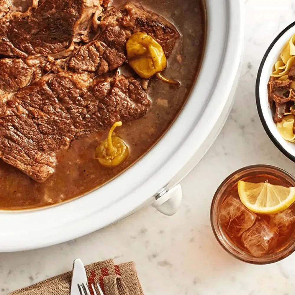 Beef Pot Roast spread with refreshing drink