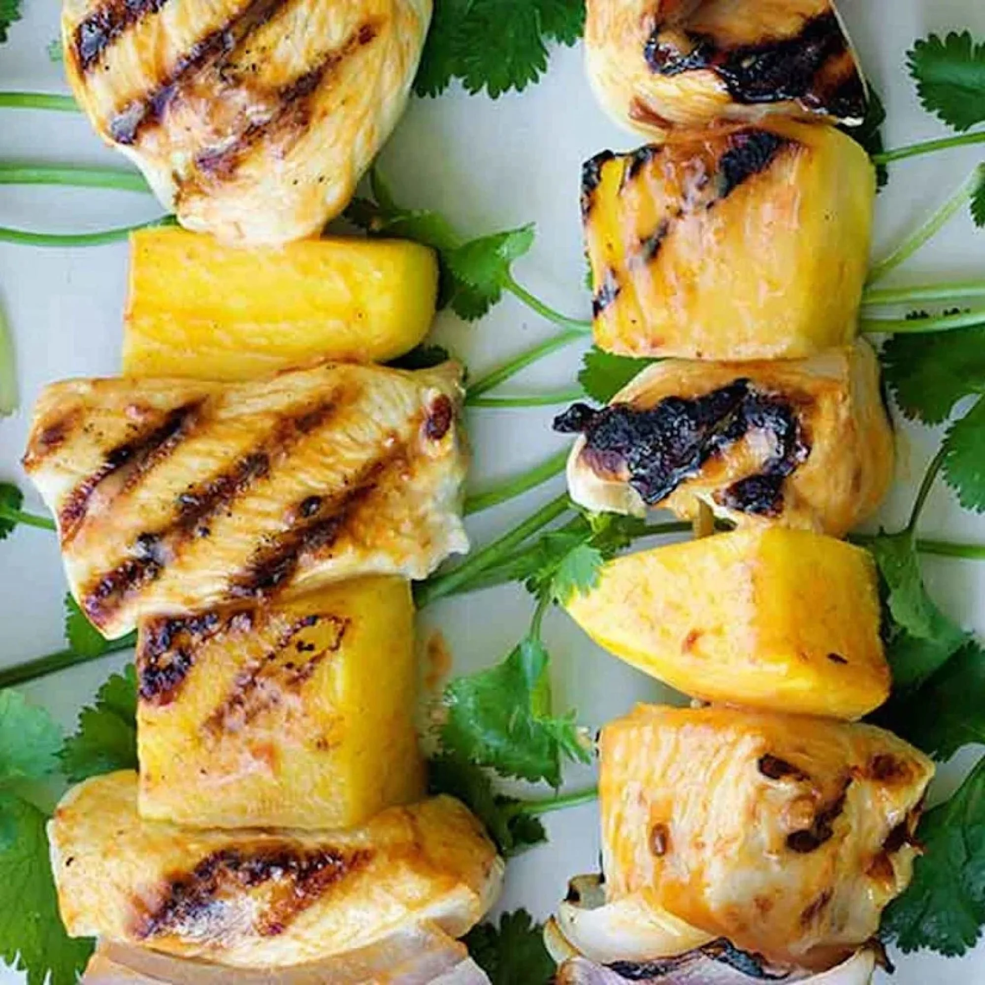 Grilled chicken and pineapple on skewers