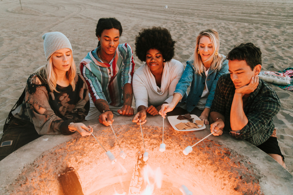 Roasting-Marshmallows-to-Make-Smores-by-the-Campfire-this-Summer 1237011667
