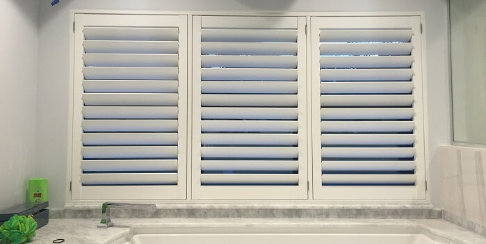 plantation shutters in Miami bathroom