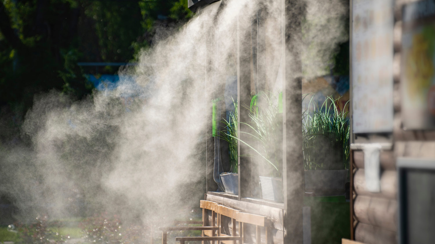 An outdoor misting system in a house’s front porch