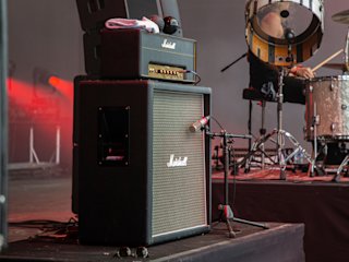Marshall JTM45 2245 stacked on a amplifier on stage