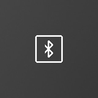 A white icon of a wireless connection on a black background for the support article pages on Marshall.com