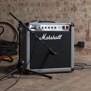 Marshall studio jubilee combo placed in a studio with brick walls