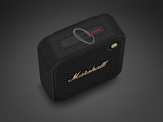 Marshall Willen II Black and Brass bluetooth portable speaker featuring built-in microphone on top.