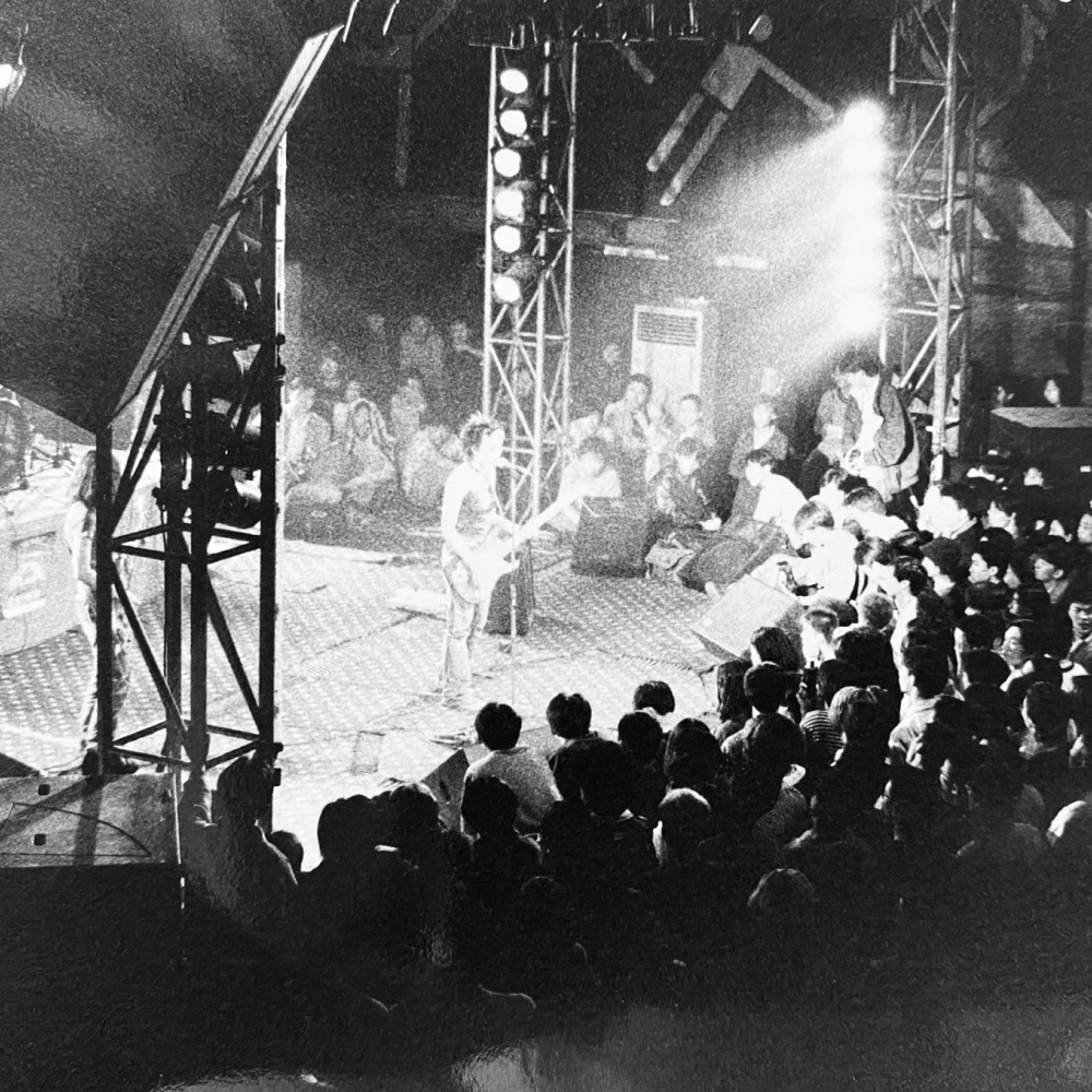 Hang On The Box preforming, Beijing 1999. Photo: James Bollon