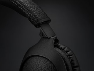 A close up of Marshall MONITOR II ANC headphones on a black background.