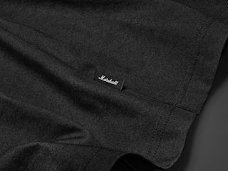 Close-Up of Side Label on the Standard Issue T-Shirt in Black