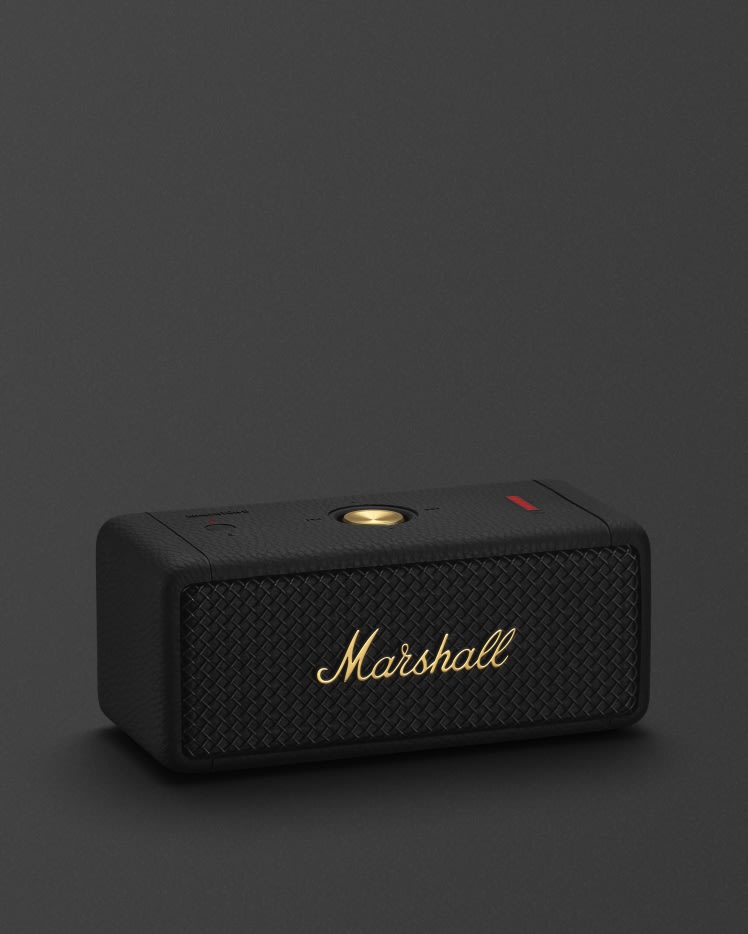 The Marshall EMBERTON II BLACK AND BRASS is a sleek black portable Bluetooth speaker.