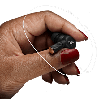 Hand holding the Marshall Motif II A.N.C. in-ear headphones