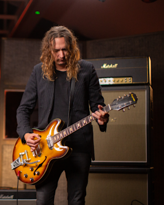 Dan Hawkins playing guitar