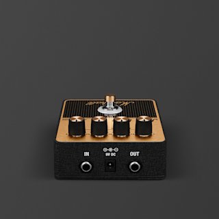 A black and brass Marshall JCM800 overdrive guitar effects pedal with four control knobs, a footswitch, and input/output jacks, viewed from the front.