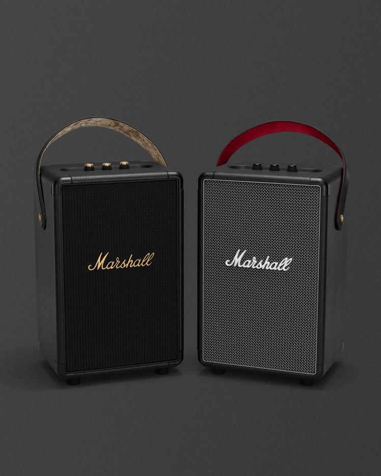 Two Marshall Tufton portable speakers on a black background.