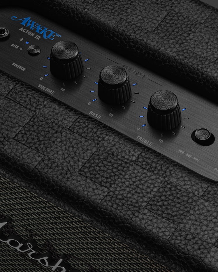 Close-up of the Marshall Acton III Awake NY Edition's control panel in black, featuring volume, bass, and treble knobs.