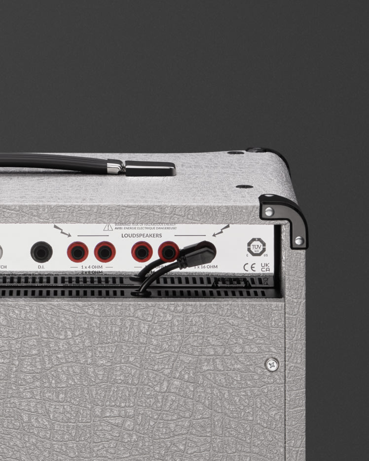 A close up of a Marshall 2525C guitar amplifier on a grey background.