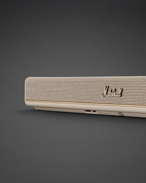 Marshall Heston 60 Cream soundbar speaker with a mesh front, gold logo, and side grille, set against a dark background.