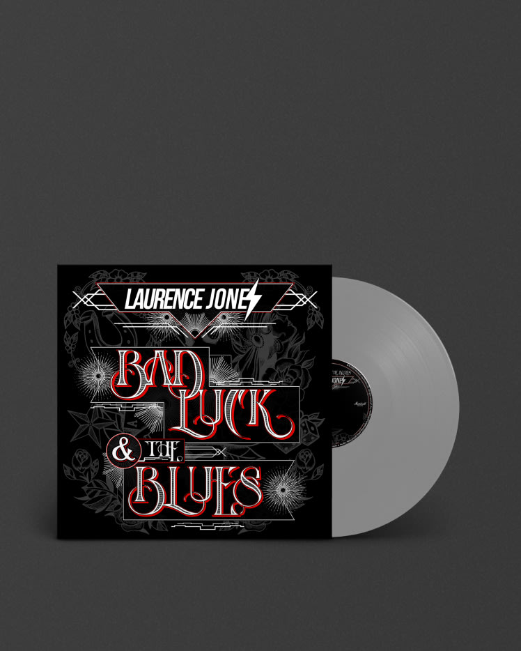 Image of the silver vinyl recore *Bad luck & the Blues' from the artist Laurence Jones.