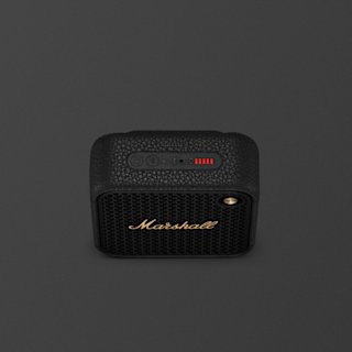 A black Marshall Willen II portable speaker with a textured surface, brass logo, and visible control buttons and battery indicator on top, shown on a dark background.
