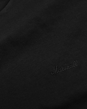 Hero image of a black fabric t-shirt with close up on script