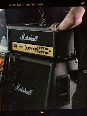 A image of stage crew setting up the Marshall JVM210 Head