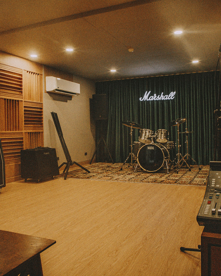 A Marshall studio room with a Natal drums at the centre