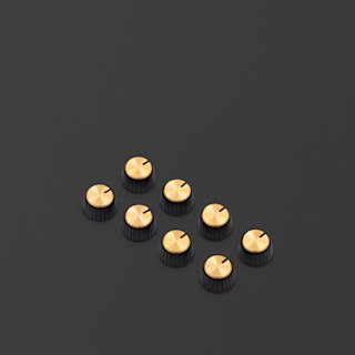 Knobs with a black body and gold cap.