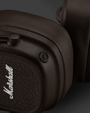 The M-button on a pair of Marshall Major V headphones.
