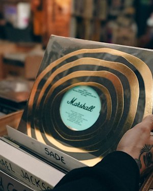 Person looking at a Marshall vinyl in store