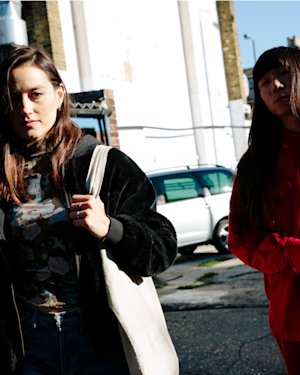 Theresa Wayman and Yuki Tsujii on the street.