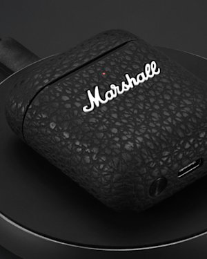 Minor III charging case on wireless charging pad.