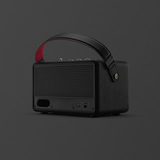 A black Marshall Kilburn III portable speaker with a carrying handle, control knobs, and input ports, displayed against a dark gray background.
