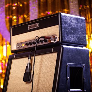 The Marshall amp head stacked on top a Marshall cabinet