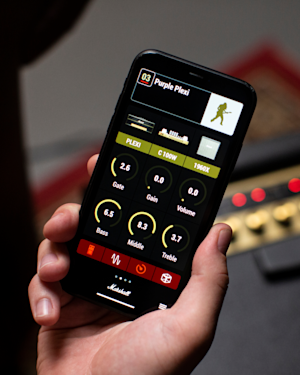 A person holding their phone with the Marshall Gateway app open.