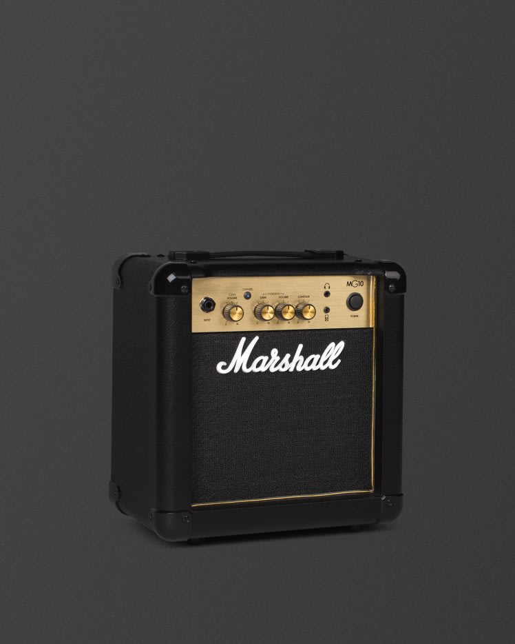 Marshall's MG10 black amplifier with gold knobs.