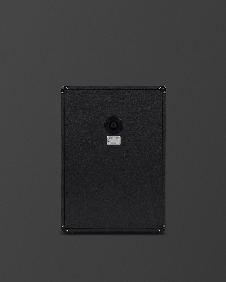 A black Marshall MX212A speaker cabinet on a grey background.