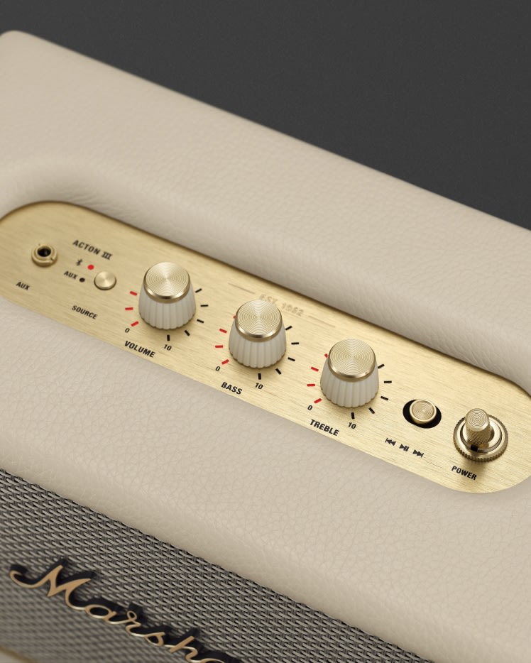 A white Marshall ACTON III CREAM speaker with buttons on it.