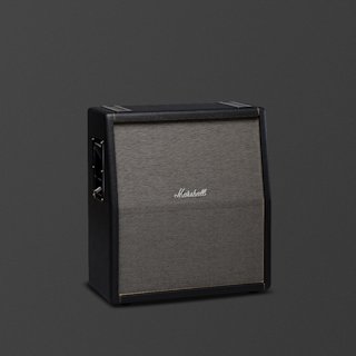A black Marshall 1960TV guitar amplifier cabinet with a Marshall logo on the grille sits on a plain dark background.