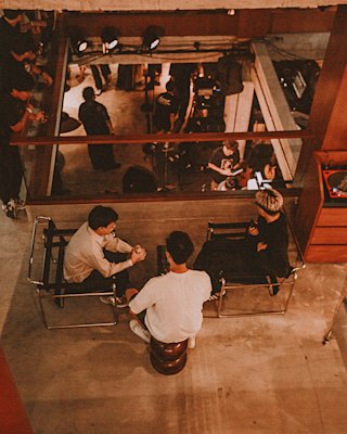 Different groups of people interacting at the Marshall Livehouse Bankok