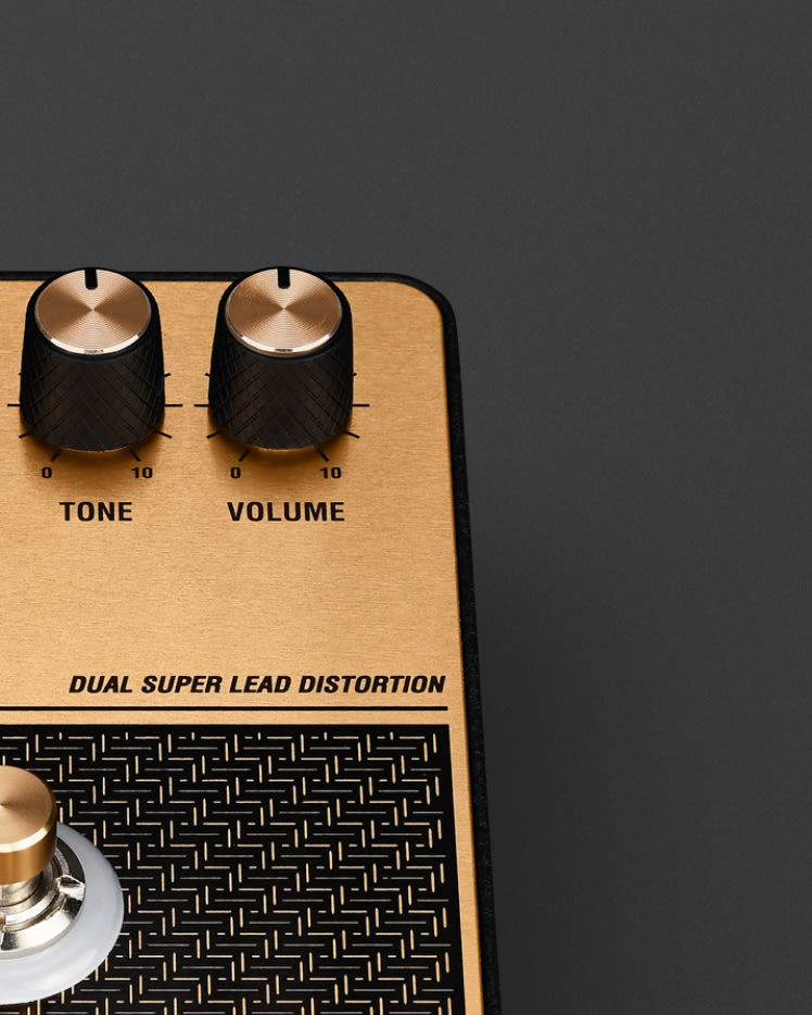 The Tone and volume knobs of the Marshall DSL Overdrive pedal.
