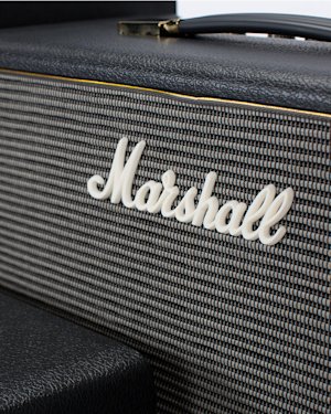 A zoomed in image of a stack of Marshall amps