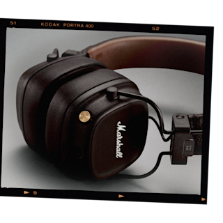 A black and brown pair of Marshall MAJOR IV headphones with a leather strap.