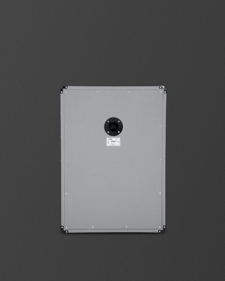 El armario 2536A de Marshall visto desde atrás, sobre un fondo gris oscuro.