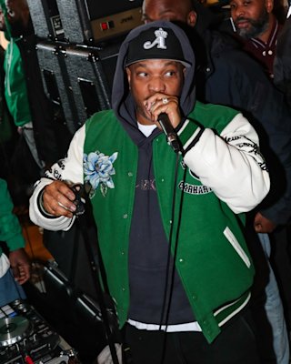 Two men in green jumpers.