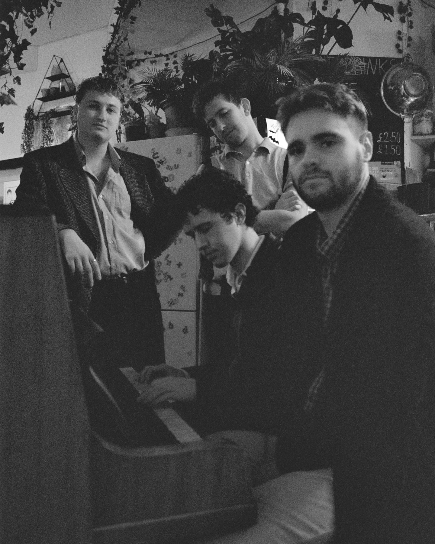 The 'Cucamaras' band in a black and white photo. 