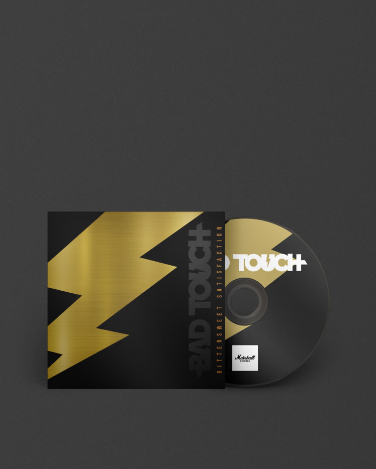 A black CD with a gold streak could be Bad Touch's Bittersweet Satisfaction, under the Marshall label.