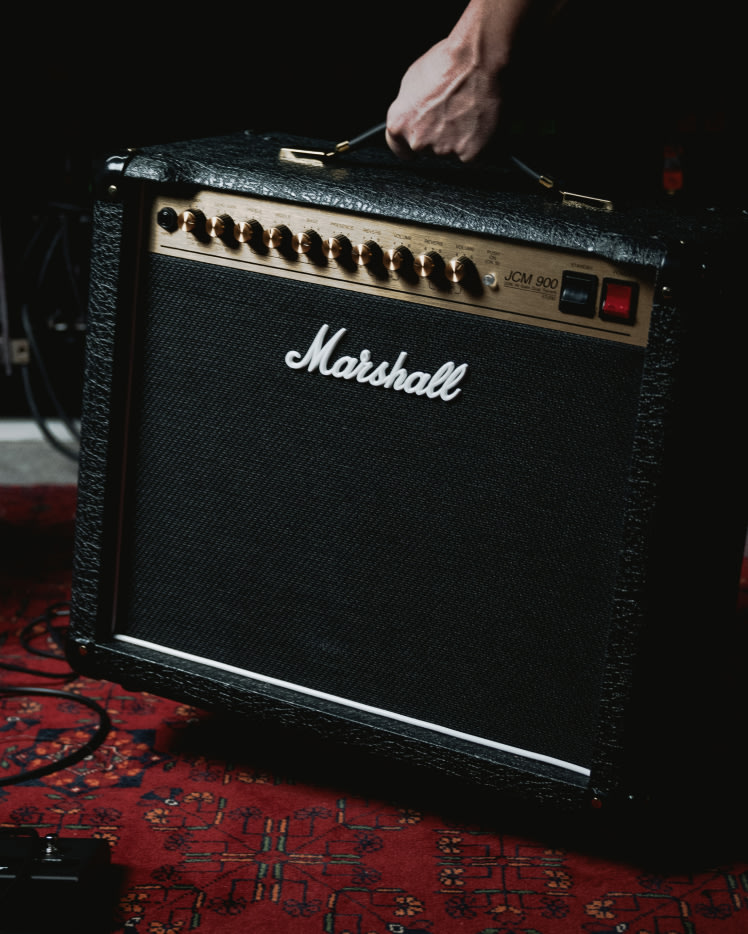 A person holding the Studio 900 Combo by the handle