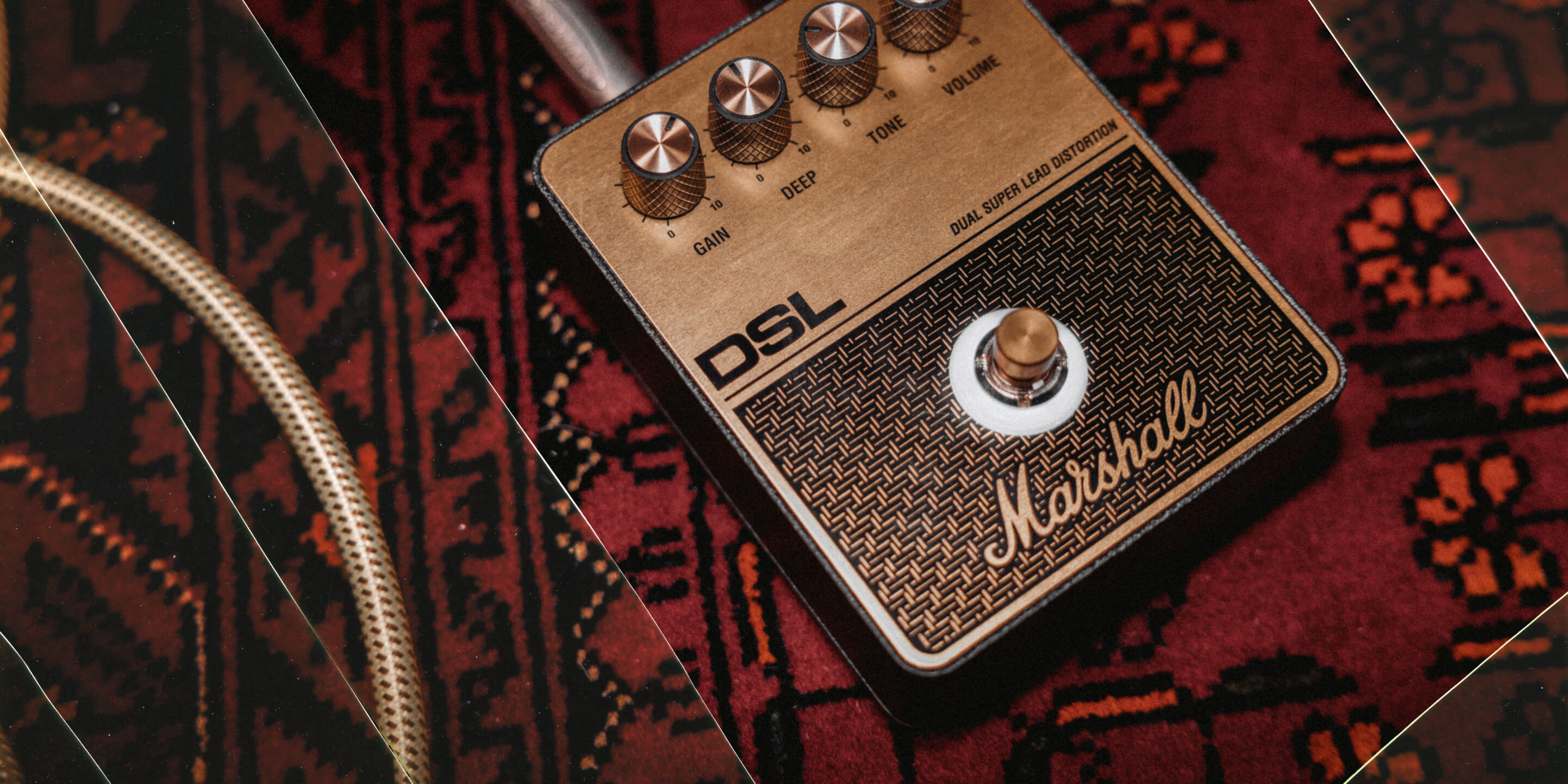 Close-up of a Marshall DSL overdrive pedal.