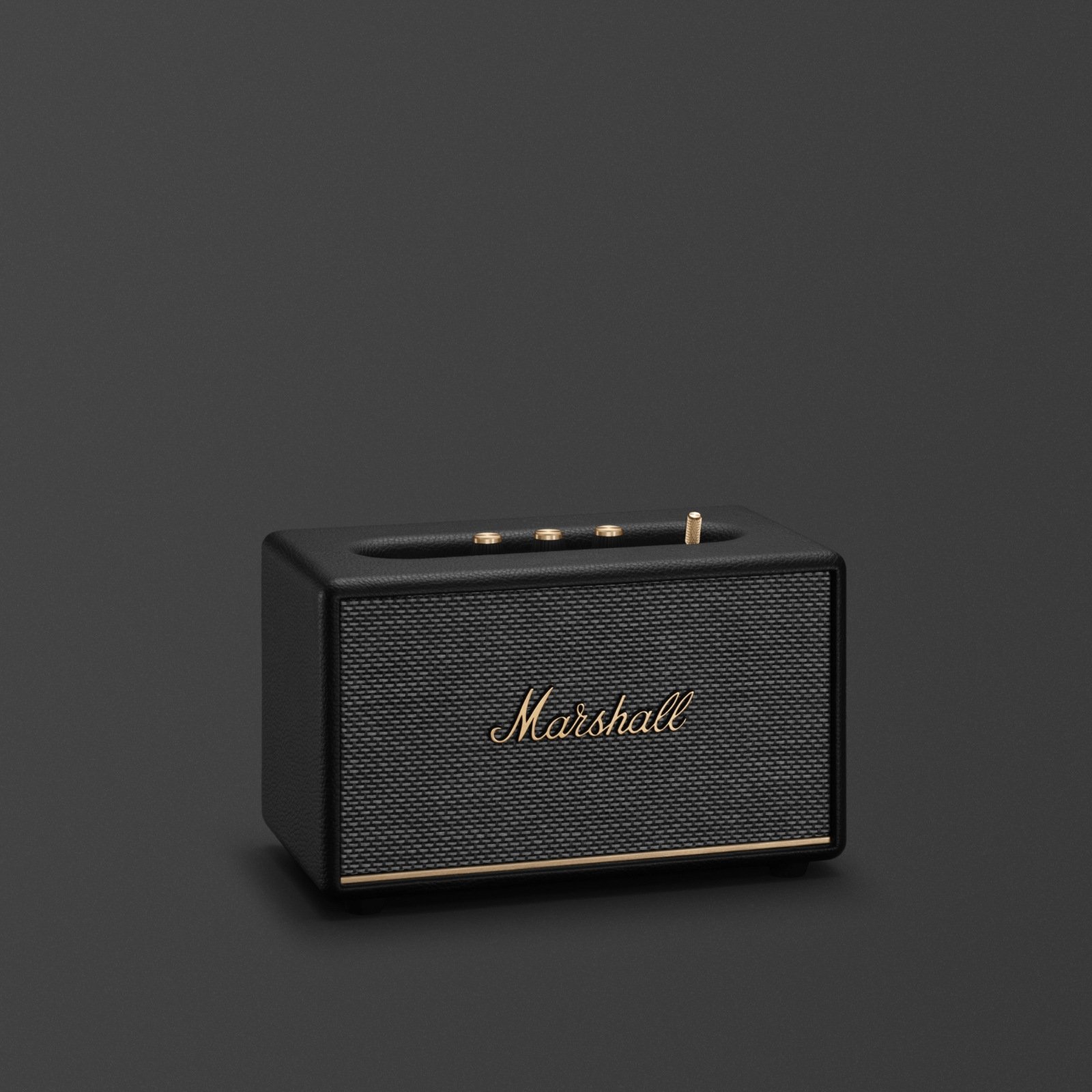 Altavoz Bluetooth Marshall Acton III en negro y dorado.